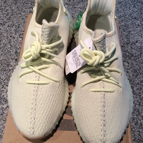 Pair of butter adidas yeezy boost 350